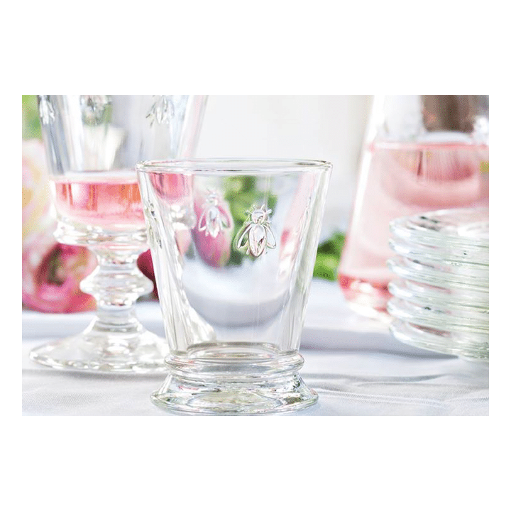 glas med bi på.