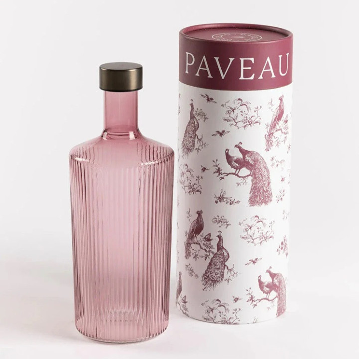 Paveau vandflaske i rillet farvet glas gammelrosa.